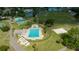 Aerial view of a park showing a swimming pool, volleyball court, and soccer fields at 4520 Wescott Ln, Tampa, FL 33624