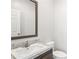 This half bath includes a sink with wood style vanity at 4568 18Th S Ave, St Petersburg, FL 33711