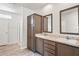 Bathroom boasts dual sinks, wooden cabinets, and a walk-in shower at 4568 18Th S Ave, St Petersburg, FL 33711