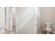 A half bathroom features modern fixtures and wood look floors at 4568 18Th S Ave, St Petersburg, FL 33711