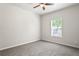 This cozy bedroom features neutral walls and plush carpet at 4568 18Th S Ave, St Petersburg, FL 33711