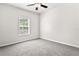 Bright bedroom with a large window for natural light and neutral carpet at 4568 18Th S Ave, St Petersburg, FL 33711