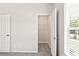 Bedroom featuring neutral carpet, a closet, and natural light at 4568 18Th S Ave, St Petersburg, FL 33711