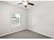 Bright bedroom with a large window for natural light and neutral carpet at 4568 18Th S Ave, St Petersburg, FL 33711