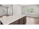 A bright and spacious kitchen island featuring wood cabinets and light countertops at 4568 18Th S Ave, St Petersburg, FL 33711