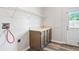 Functional laundry room features stylish flooring, new cabinets, and ample storage space at 4568 18Th S Ave, St Petersburg, FL 33711