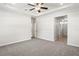 Spacious main bedroom featuring a tray ceiling, ceiling fan and neutral decor at 4568 18Th S Ave, St Petersburg, FL 33711