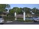 Habana Park condominium community entrance sign with visitor parking and lush green landscaping at 4724 Michael Ct # 122, Tampa, FL 33614
