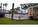 Community pool and multi-story condos with balcony access and well-maintained landscaping at 4724 Michael Ct # 122, Tampa, FL 33614