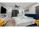 Spacious bedroom with wood floors, natural light, and minimalist décor at 5298 Florentine Ct, Spring Hill, FL 34608
