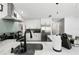Renovated kitchen features a stainless fridge, modern faucet, and updated appliances at 5298 Florentine Ct, Spring Hill, FL 34608