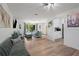 Bright living room with hardwood floors, modern furnishings, and natural light at 5298 Florentine Ct, Spring Hill, FL 34608