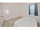 Clean bedroom offering neutral carpet, a window, and recessed lighting at 5548 Silver Sun Dr, Apollo Beach, FL 33572