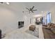 Open-concept living area showcasing modern finishes, tile floors, and ample natural light at 5548 Silver Sun Dr, Apollo Beach, FL 33572