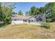 Home's backyard featuring a fenced yard with screened-in pool at 6302 Silver Oaks Dr, Zephyrhills, FL 33542