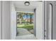 View from entry of welcoming front yard and landscaped walkway at 6302 Silver Oaks Dr, Zephyrhills, FL 33542