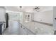 Bright kitchen featuring granite countertops and stainless steel appliances at 6302 Silver Oaks Dr, Zephyrhills, FL 33542