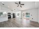 Open kitchen featuring granite countertops, stainless appliances, and a view of the pool at 6302 Silver Oaks Dr, Zephyrhills, FL 33542