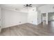 Bright, open living room with new floors, neutral paint, and high ceilings at 6302 Silver Oaks Dr, Zephyrhills, FL 33542
