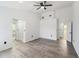 Spacious main bedroom with new floors, neutral colors, and ensuite bath at 6302 Silver Oaks Dr, Zephyrhills, FL 33542