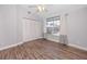 Cozy bedroom boasts a ceiling fan, wood floors and a closet at 6600 121St Ave # 4, Largo, FL 33773