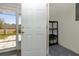 Doorway into storage area, with shelving at 6600 121St Ave # 4, Largo, FL 33773