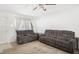 Bright living room featuring comfortable seating, neutral tones, and a cozy ambiance at 8004 N Brooks St, Tampa, FL 33604