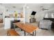 Bright and open living space combines dining, kitchen, and living room for seamless entertaining and Gathering time at 8004 N Brooks St, Tampa, FL 33604