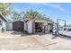 Open garage space revealing a concrete floor, white exterior, and brown steel doors at 9236 Suncoast Terrace, Hudson, FL 34667