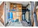 Utility room featuring a water tank and other equipment at 9236 Suncoast Terrace, Hudson, FL 34667
