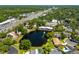 Community aerial view showcasing the waterfont property and surrounding landscape at 10605 Carrollbrook Ln, Tampa, FL 33618