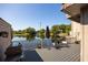 Lovely outdoor deck with lake view and grill at 10605 Carrollbrook Ln, Tampa, FL 33618