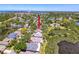 Aerial view of a property with an arrow showing the location near a lake at 1003 Teal Pointe, Tarpon Springs, FL 34689