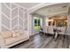 Stylish dining room with decorative wall accents, comfortable seating, and views into the well-appointed kitchen at 10528 Bermuda Isle Dr, Tampa, FL 33647