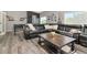 Comfortable living room features a plush leather sofa, hardwood floors, and stylish decor at 10528 Bermuda Isle Dr, Tampa, FL 33647