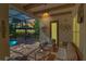 Screened patio with outside dining and conversation areas, accented by exterior lighting and pool view at 10528 Bermuda Isle Dr, Tampa, FL 33647
