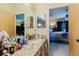 Bathroom features double sinks, granite countertops, and an open view to the main bedroom at 11209 Pocket Brook Dr, Tampa, FL 33635
