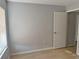 Bedroom featuring wood laminate flooring, neutral paint, and a window at 11405 3Rd N St # 2, St Petersburg, FL 33716