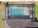 Aerial shot of the screened pool and patio, set in a large backyard with lush landscaping at 11852 Lake Lucaya Dr, Riverview, FL 33579