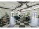 Large open clubhouse area with comfortable seating and stylish decor, perfect for community gatherings at 11852 Lake Lucaya Dr, Riverview, FL 33579