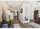 Elegant entryway with wood-look tile flooring and decorative accents at 11852 Lake Lucaya Dr, Riverview, FL 33579