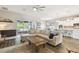 Spacious living room with a seamless flow to the kitchen and patio, perfect for entertaining and relaxing at 11852 Lake Lucaya Dr, Riverview, FL 33579
