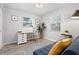 Home office featuring a work desk, comfortable seating, and plenty of natural light at 1276 Bertland Way, Clearwater, FL 33755