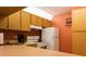 Well-maintained kitchen area with essential appliances and ample countertop space at 1309 Pine Ridge E Cir # D3, Tarpon Springs, FL 34688
