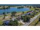 Stunning home boasting mature landscaping and a serene lake view at 13421 Sydney Rd, Valrico, FL 33594