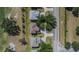 Aerial view of homes with driveways lined with trees and manicured landscaping at 13421 Sydney Rd, Valrico, FL 33594