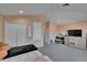 Bedroom featuring a large double closet, soft peach walls, and carpeted floor at 13421 Sydney Rd, Valrico, FL 33594