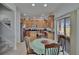 Open kitchen and dining area, with stainless steel appliances and backyard views at 13421 Sydney Rd, Valrico, FL 33594