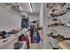 Well-organized walk-in closet with shelving and clothing racks for optimal storage at 13421 Sydney Rd, Valrico, FL 33594