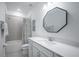 Clean bathroom with a single vanity, modern finishes, and a shower-tub combination at 14146 Samoa Hill Ct, Riverview, FL 33569